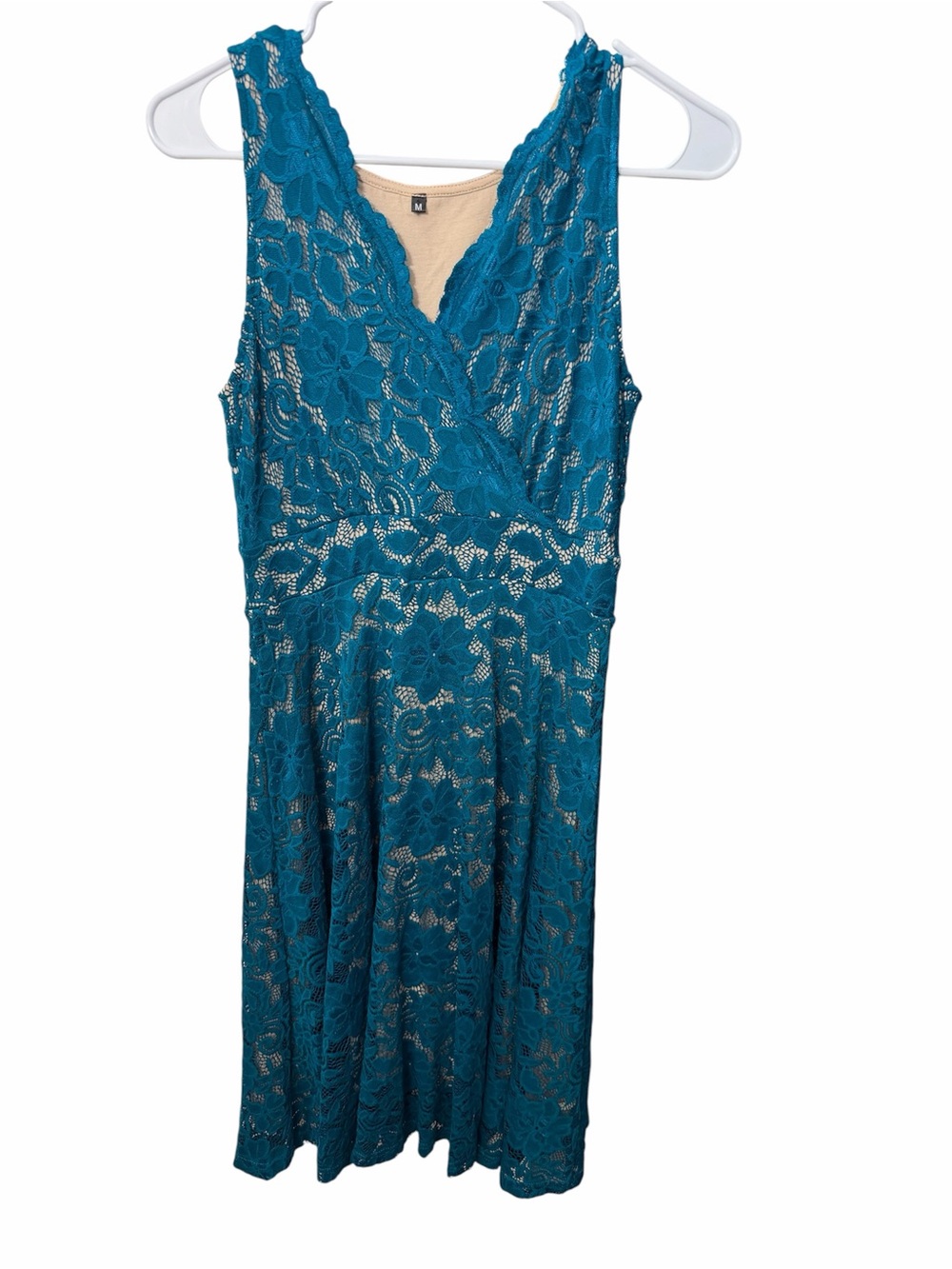 Women’s Teal lace size medium knee length dress with a tan slip attached. EUC!